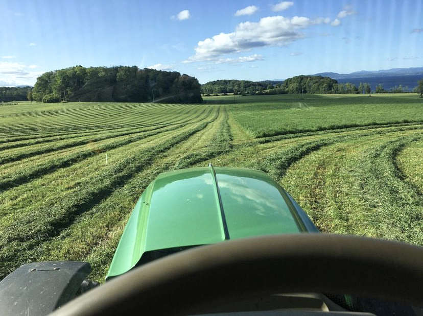 view of freshly cut fields from the tractor driver's POV