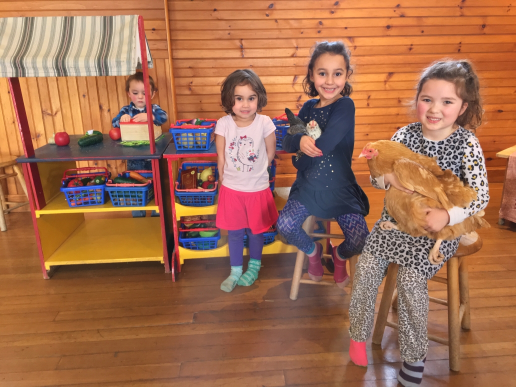 kids with chickens