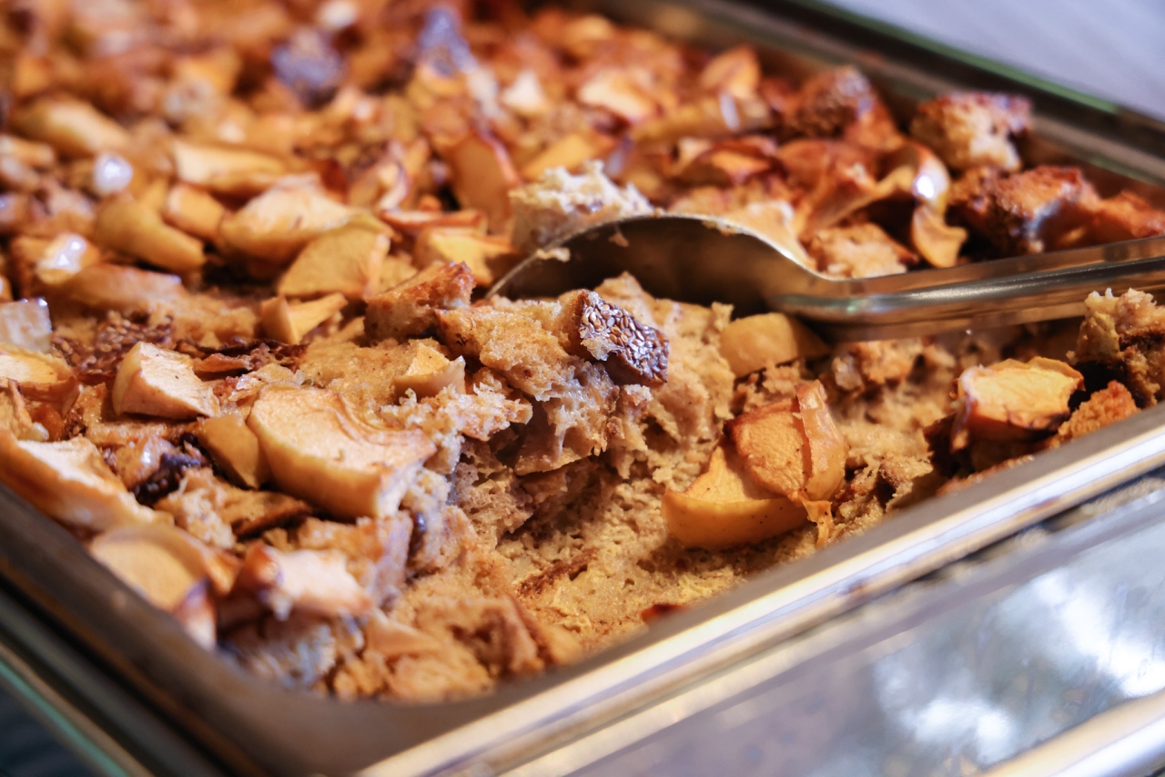 A deep pan of a baked bread pudding