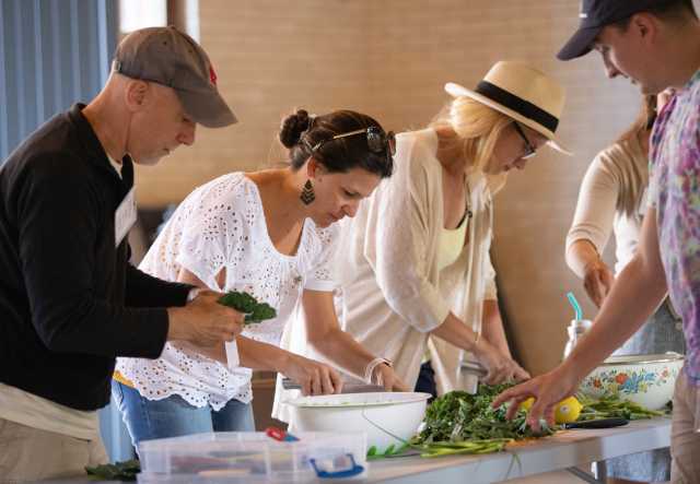 Farm to School Institute participants cook together during a workshop