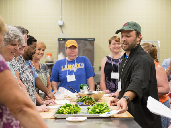 Chef Jim working with cafeteria staff at Milton High School during the 2018 Child Nutrition Programs Summer Institute