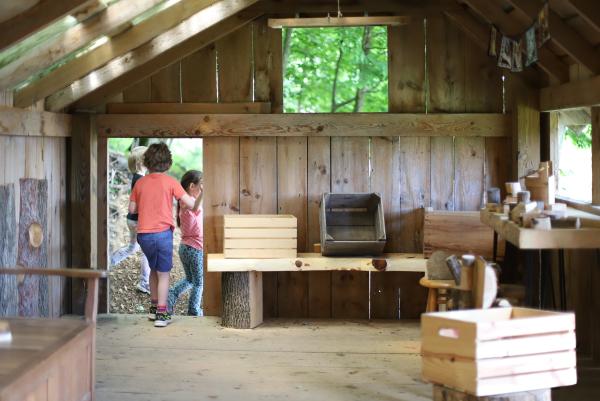 inside the Forest house - a kid-sized wooden play space. 