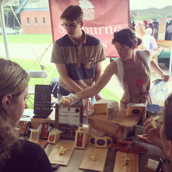 Myself and Katherine Howe serving Shelburne Farms cheddar samples at Cheese Fest