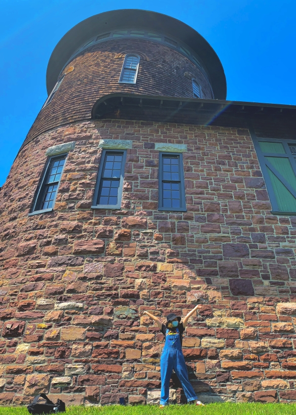 A student celebrates outside the Farm Barn turret! (photo: Winooski student)