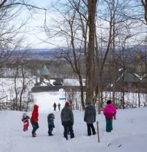 Visitors enjoying a snowy day at Shelburne Farms